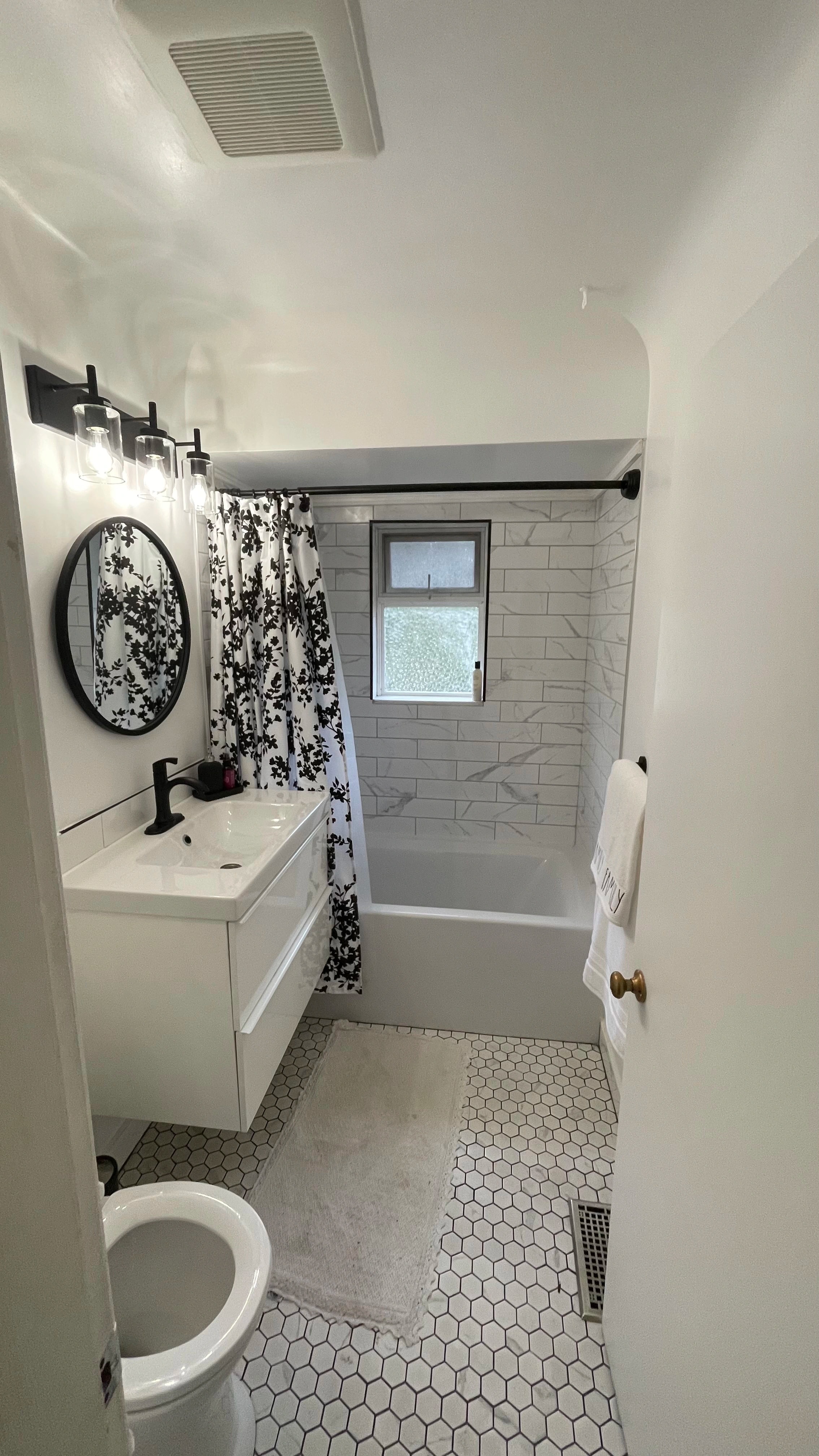 beige house washroom by CVR Construction