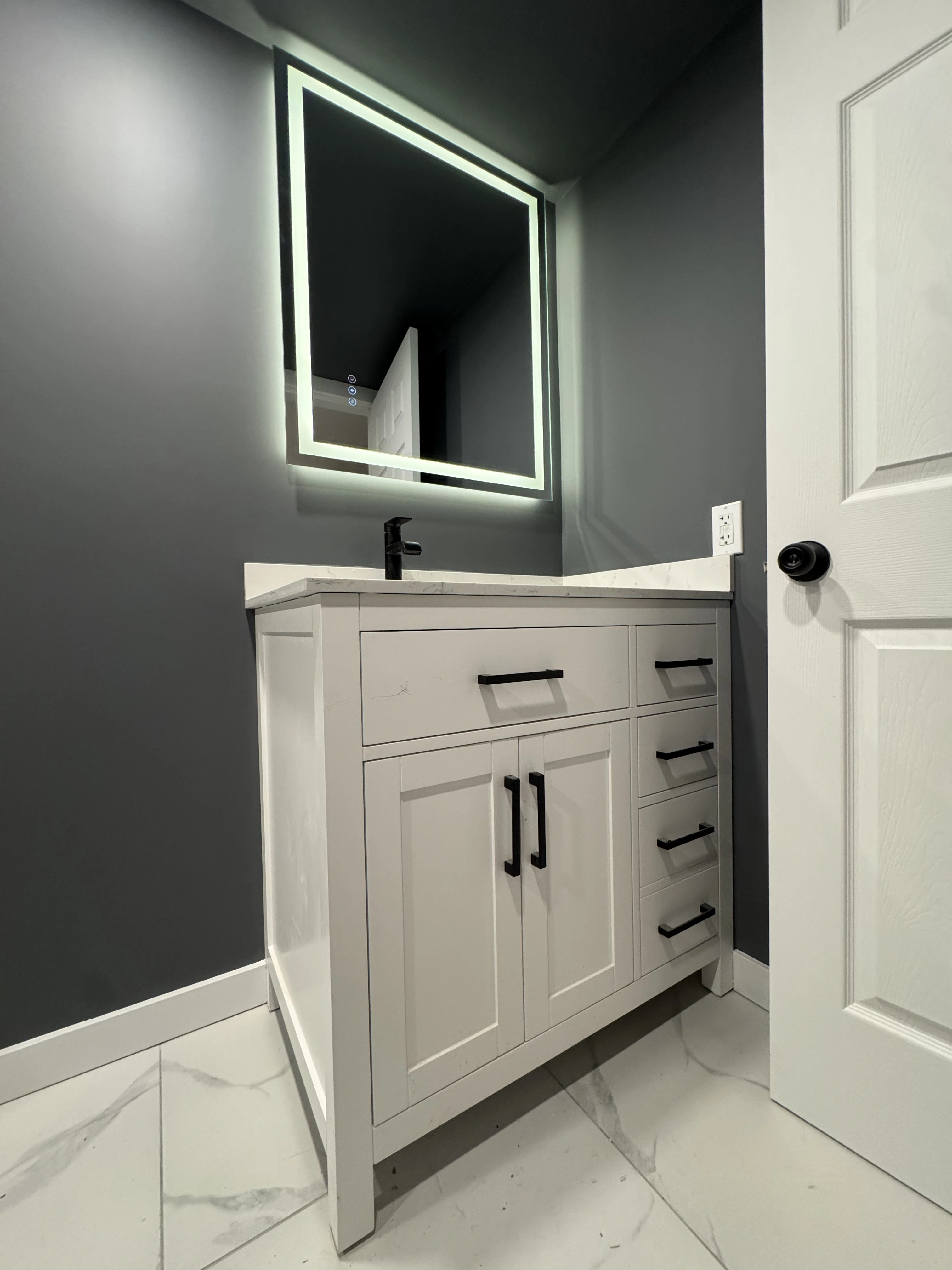 dark gray kitchen and bath by CVR Construction