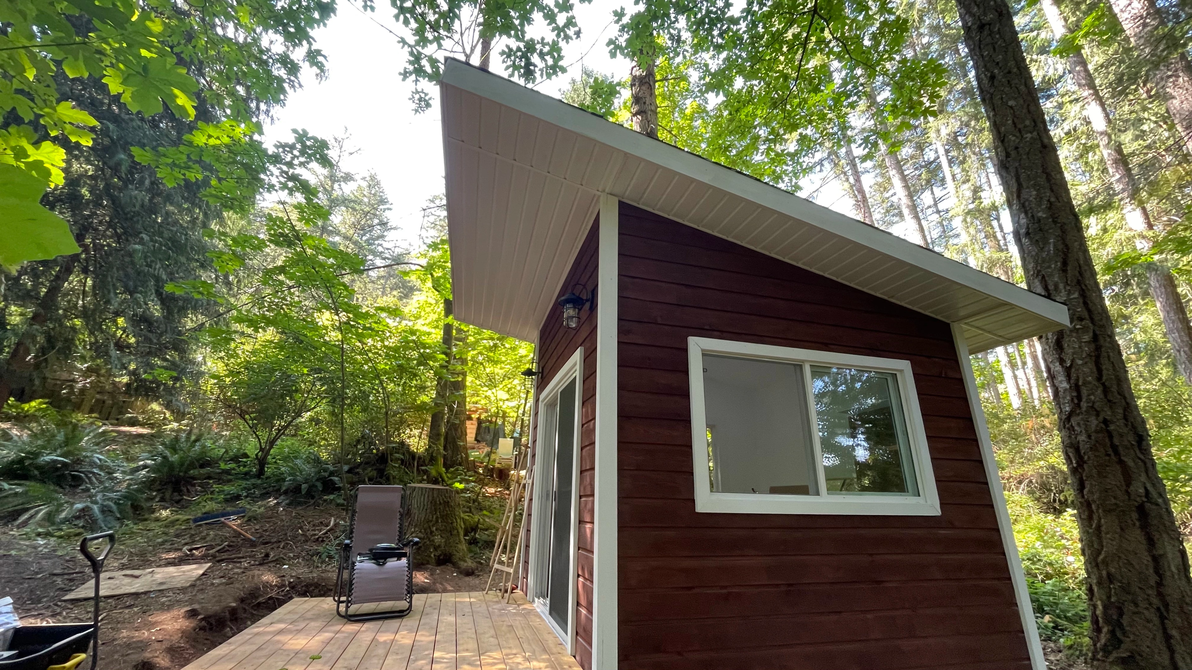 forest cabin and outhouse by CVR Construction