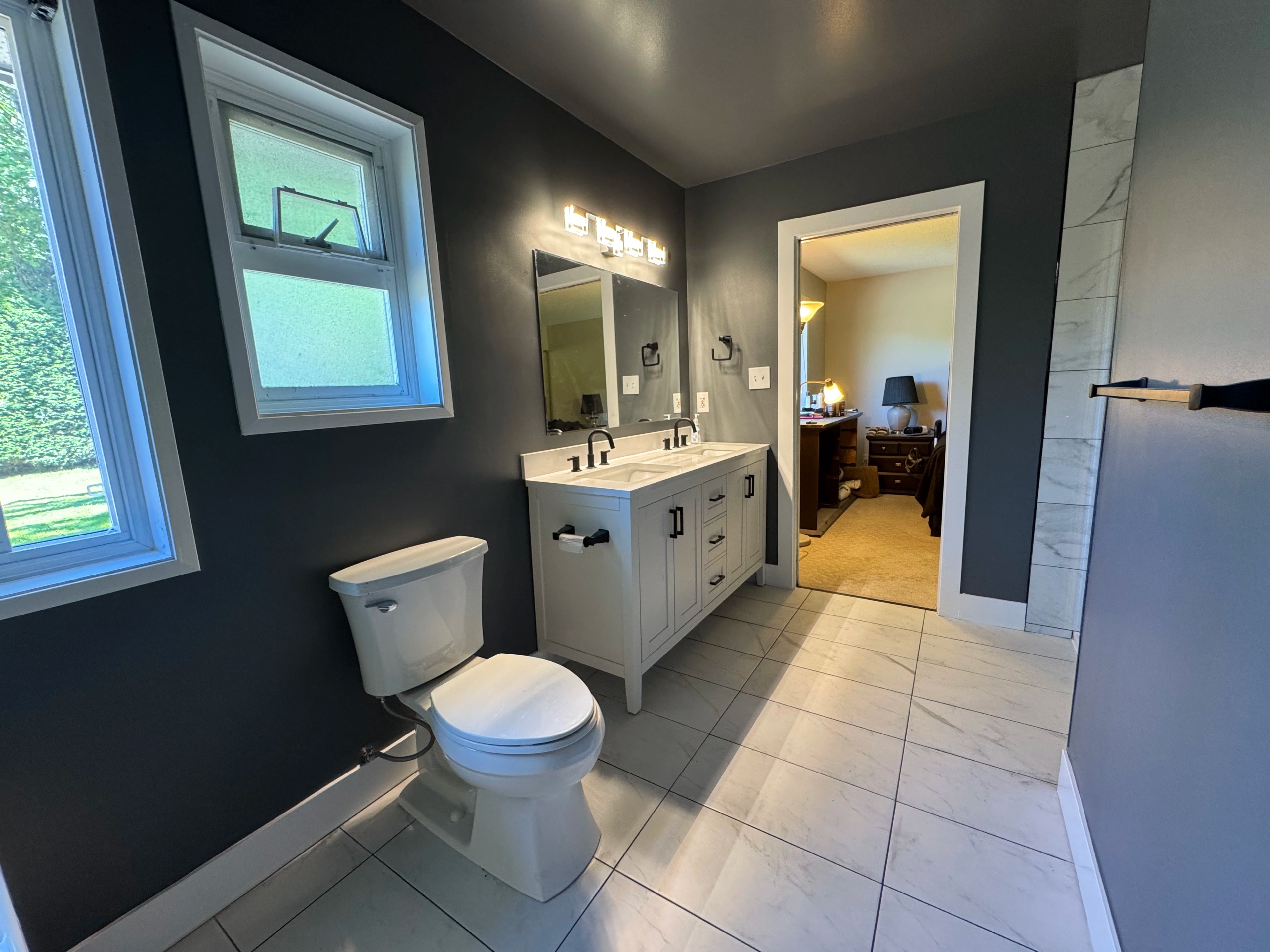 modern bath and laundry suite by CVR Construction