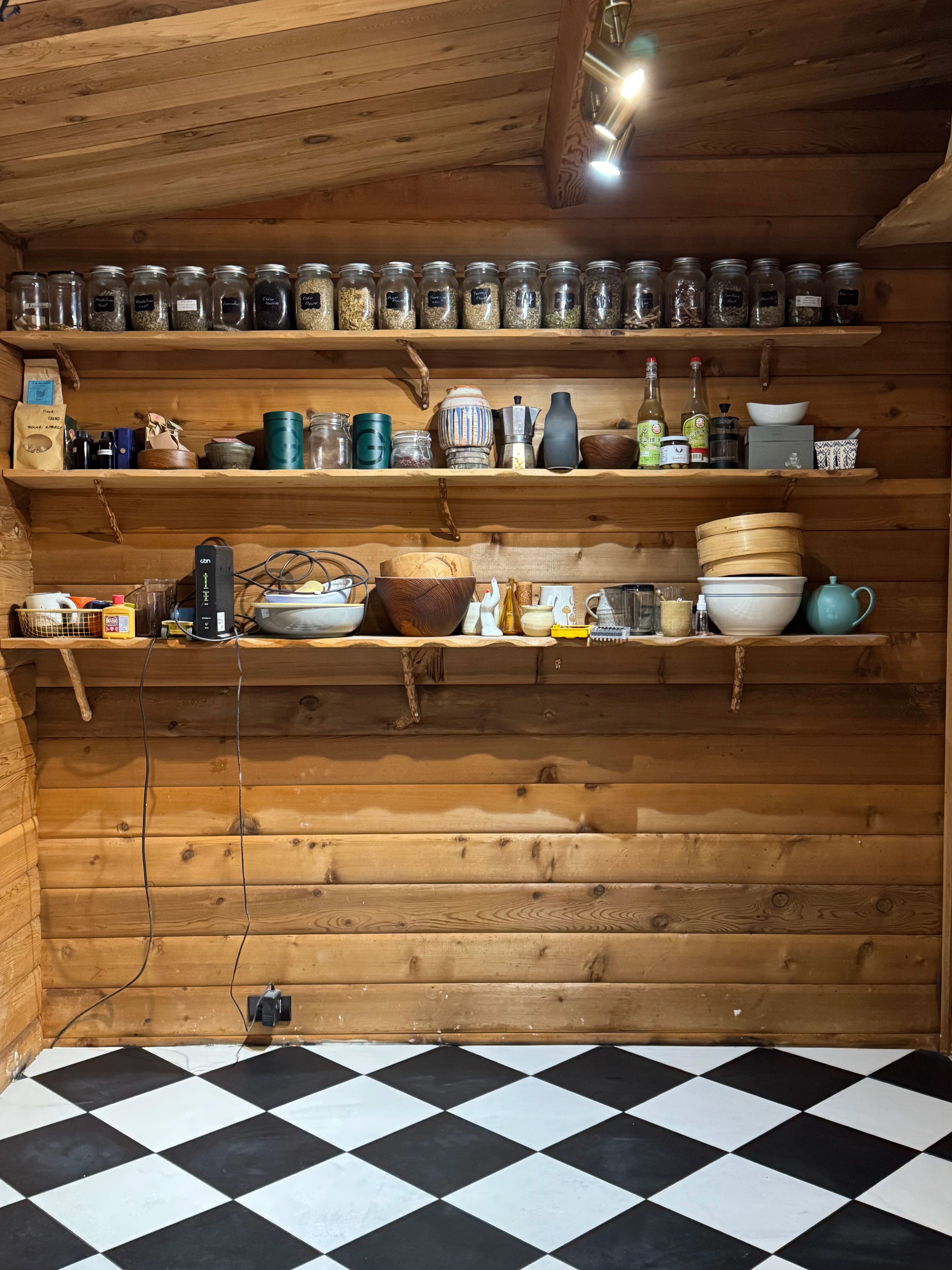 rustic checkerboard cabin kitchen by CVR Construction