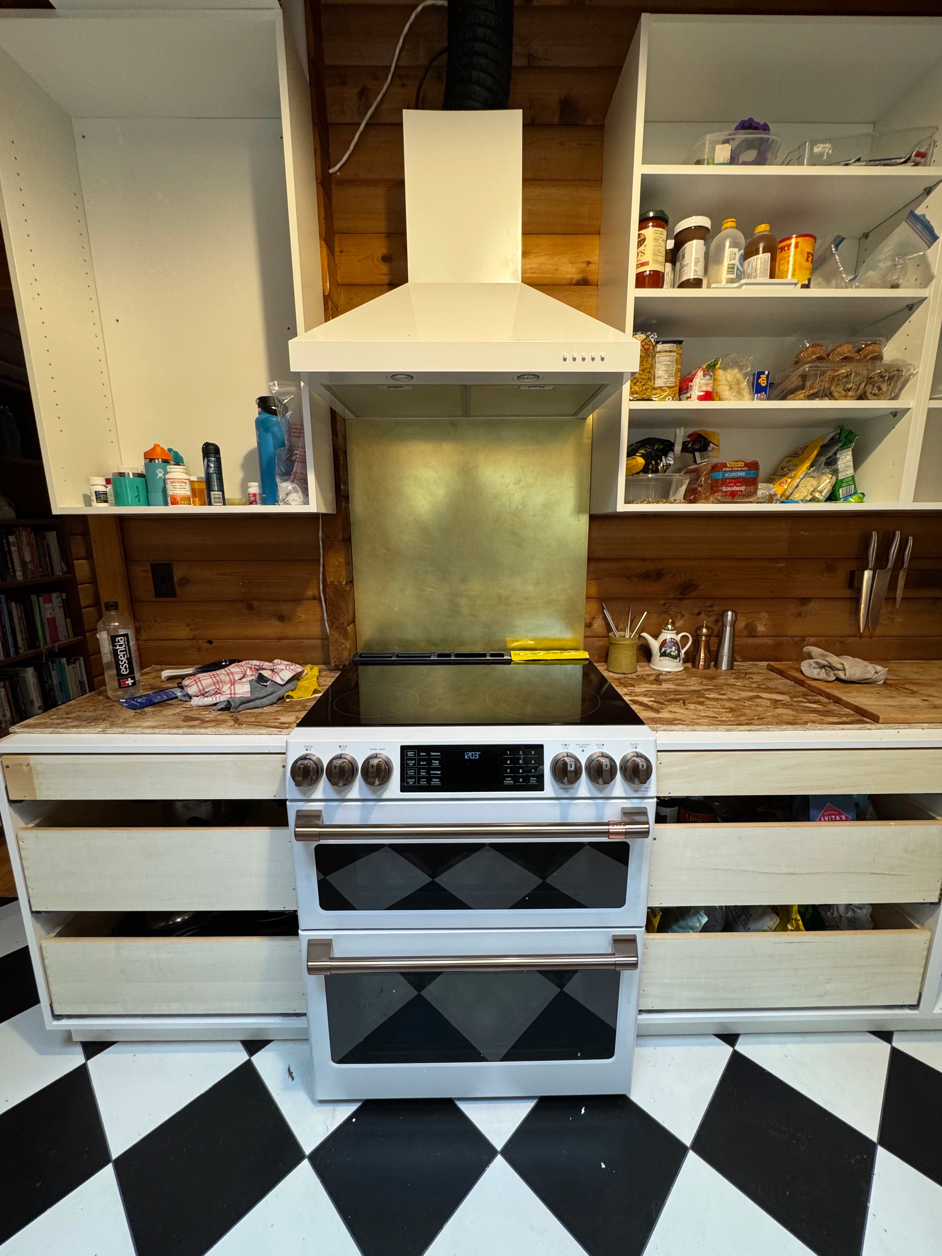 rustic checkerboard cabin kitchen by CVR Construction