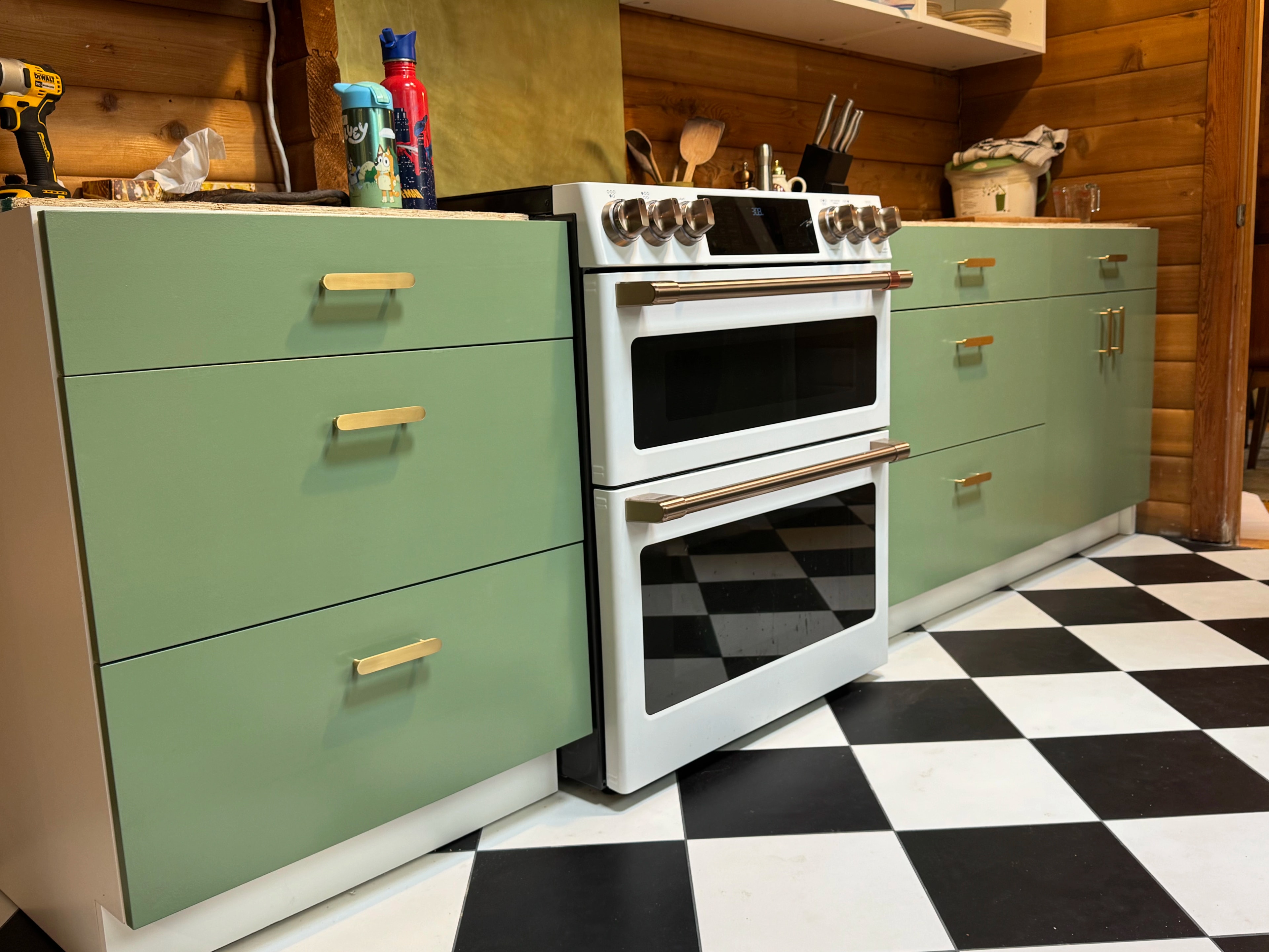 rustic checkerboard cabin kitchen by CVR Construction