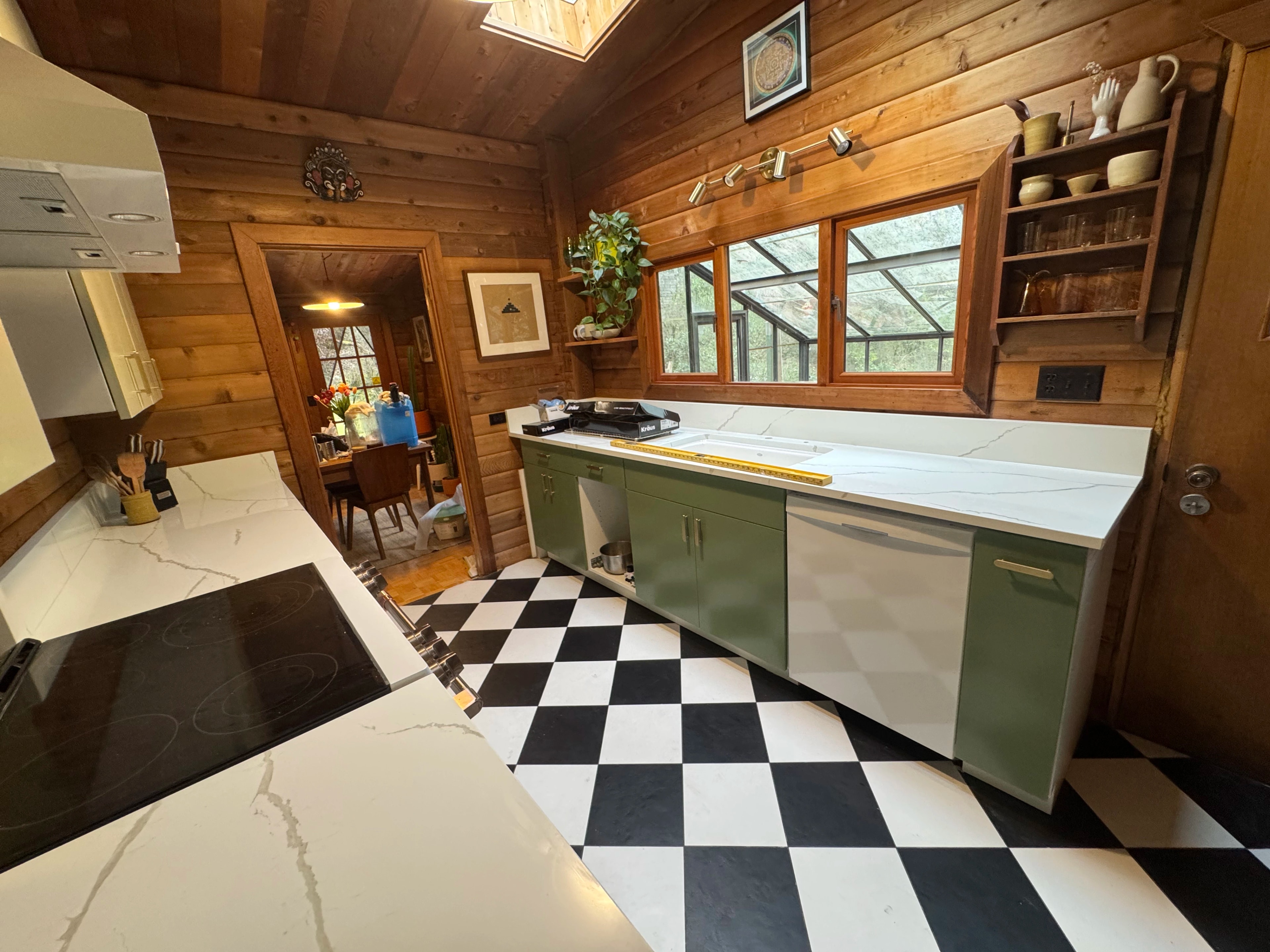 rustic checkerboard cabin kitchen by CVR Construction
