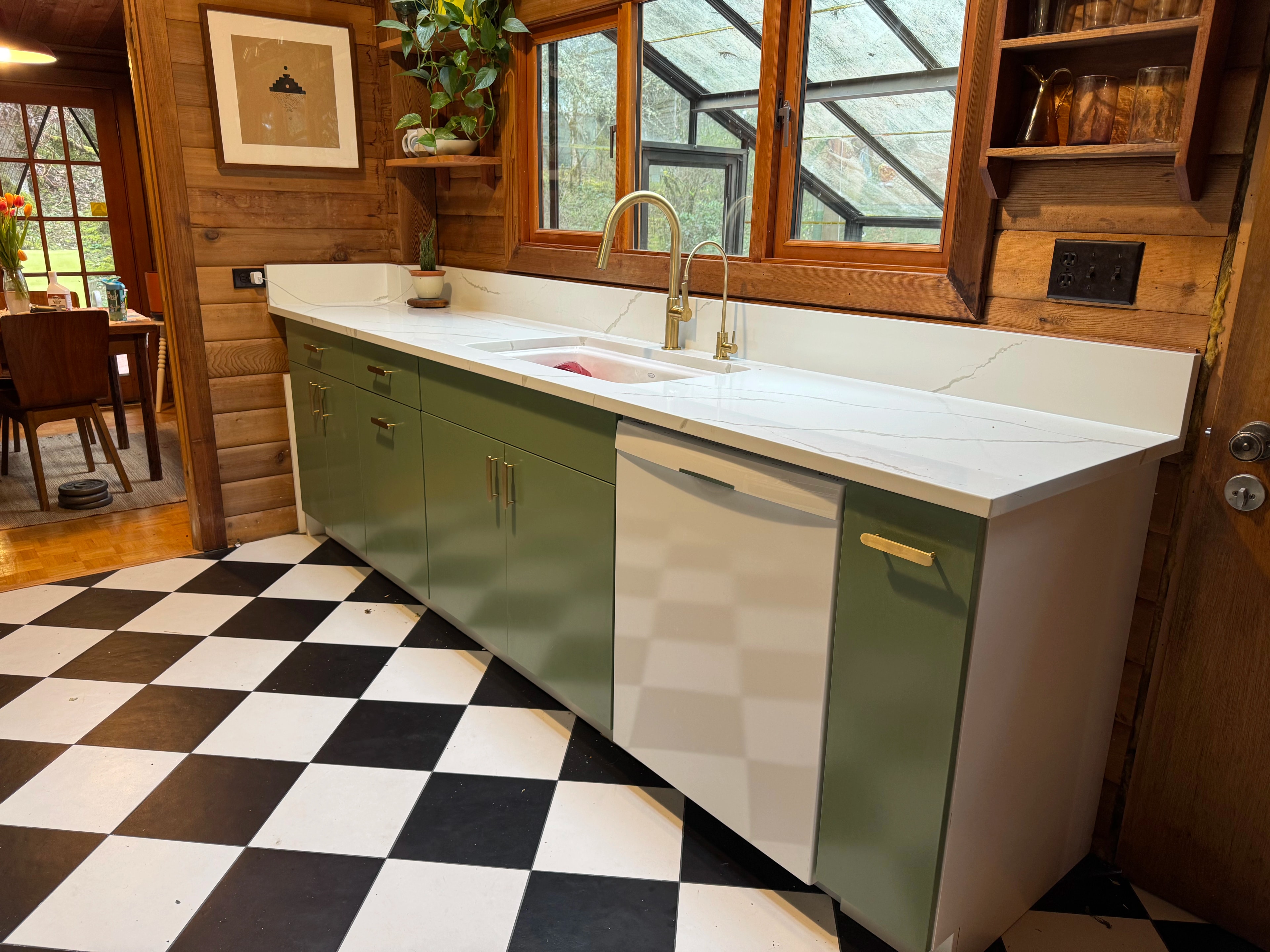rustic checkerboard cabin kitchen by CVR Construction