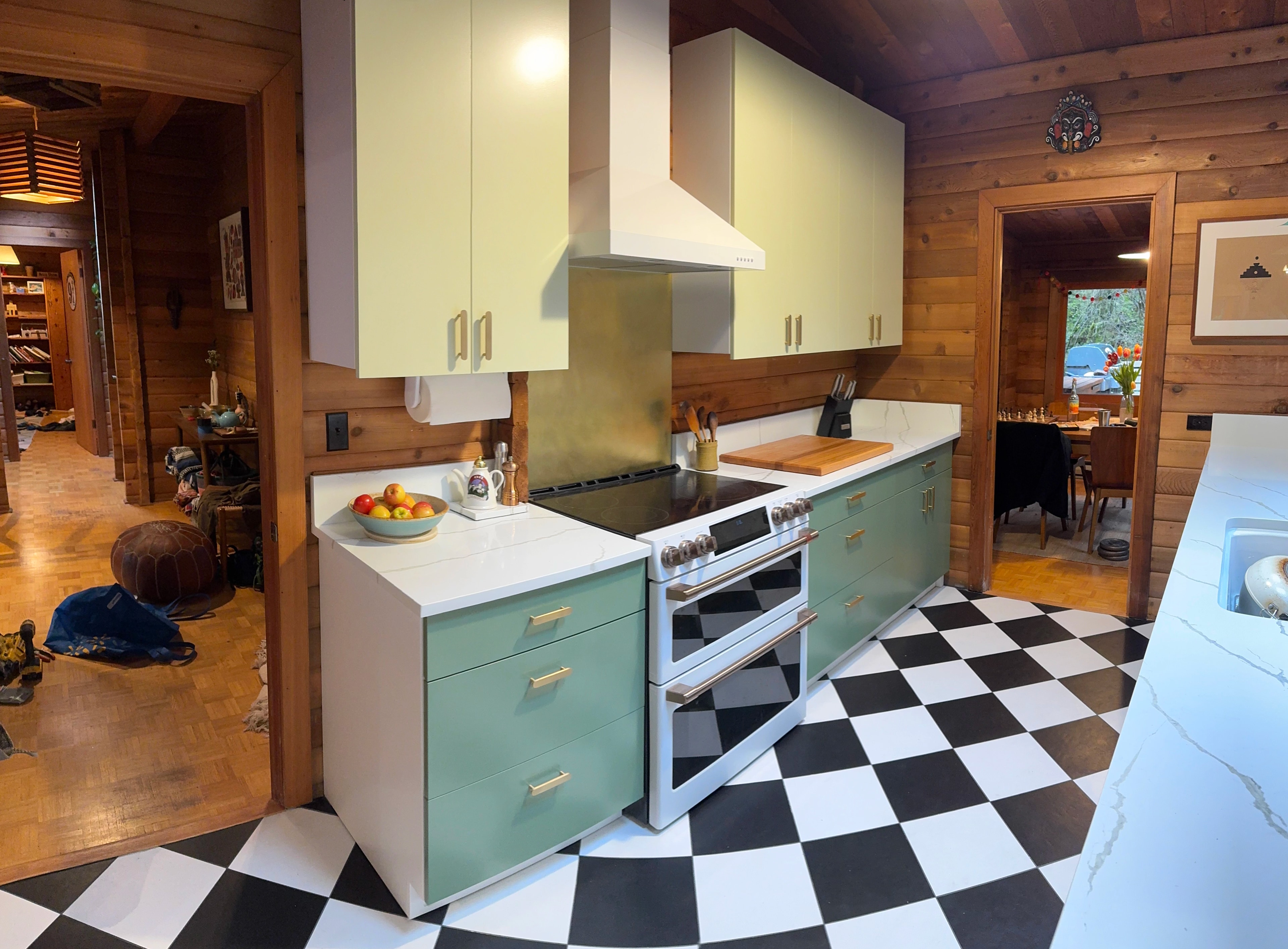 rustic checkerboard cabin kitchen by CVR Construction