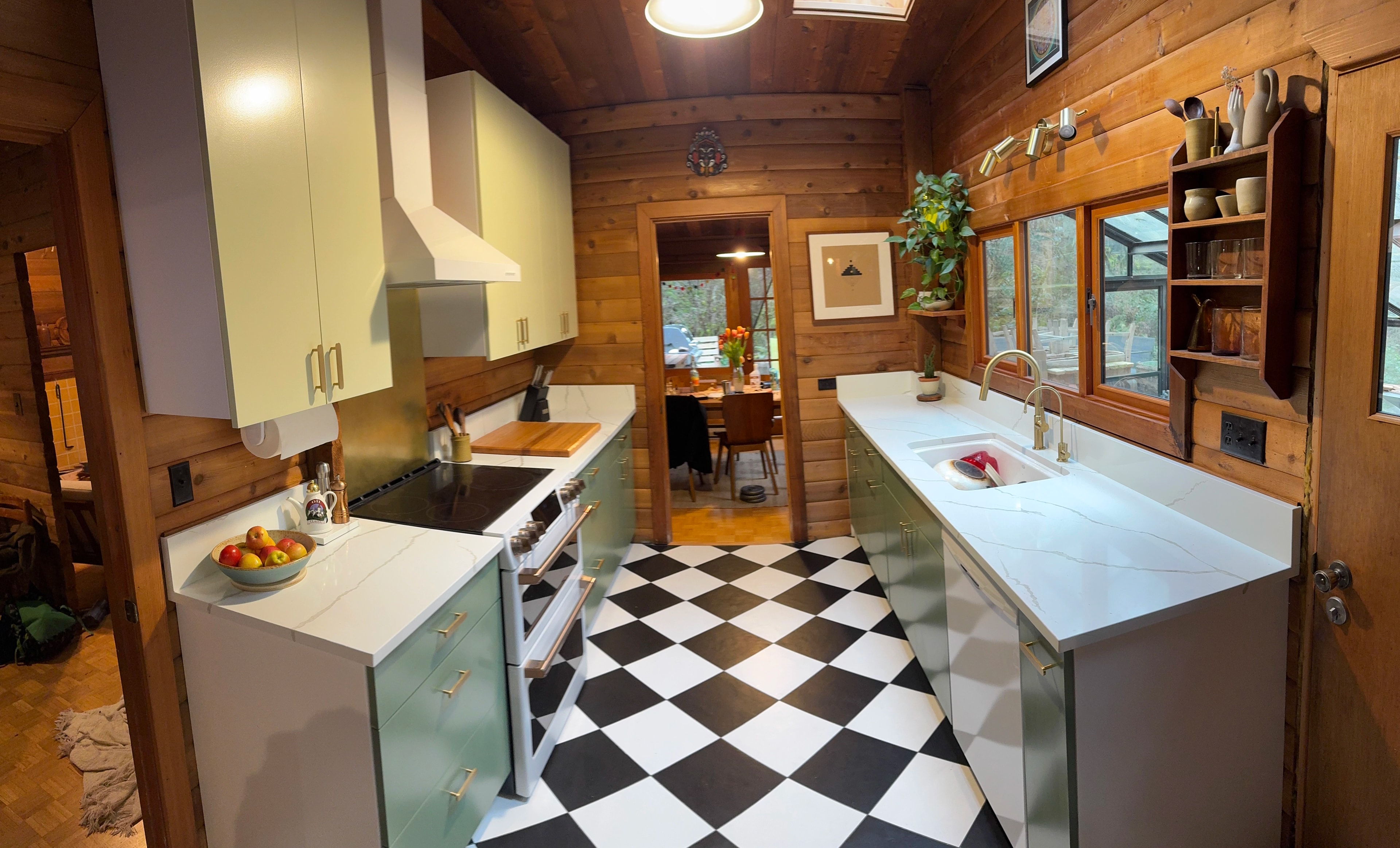 rustic checkerboard cabin kitchen by CVR Construction