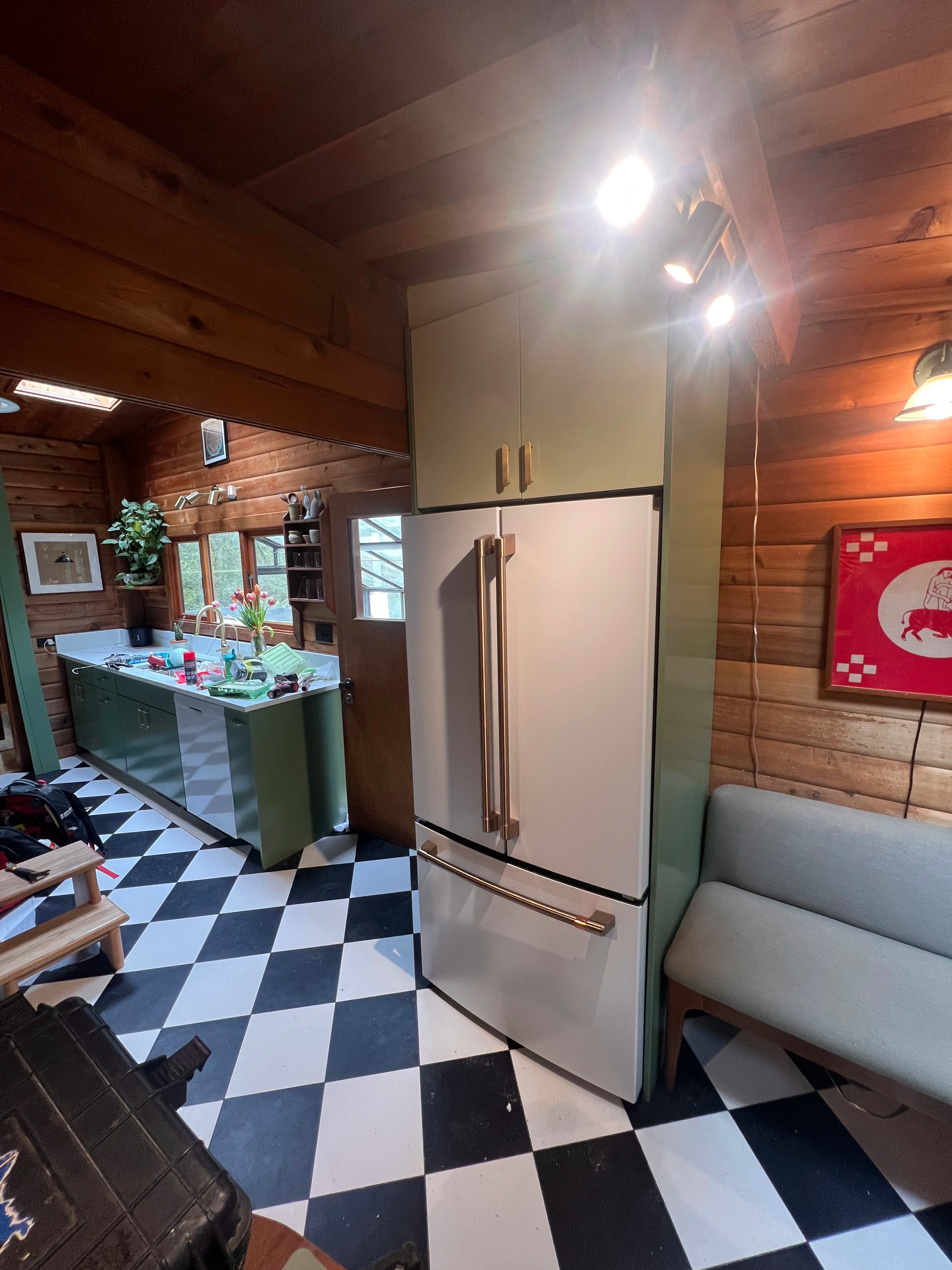 rustic checkerboard cabin kitchen by CVR Construction