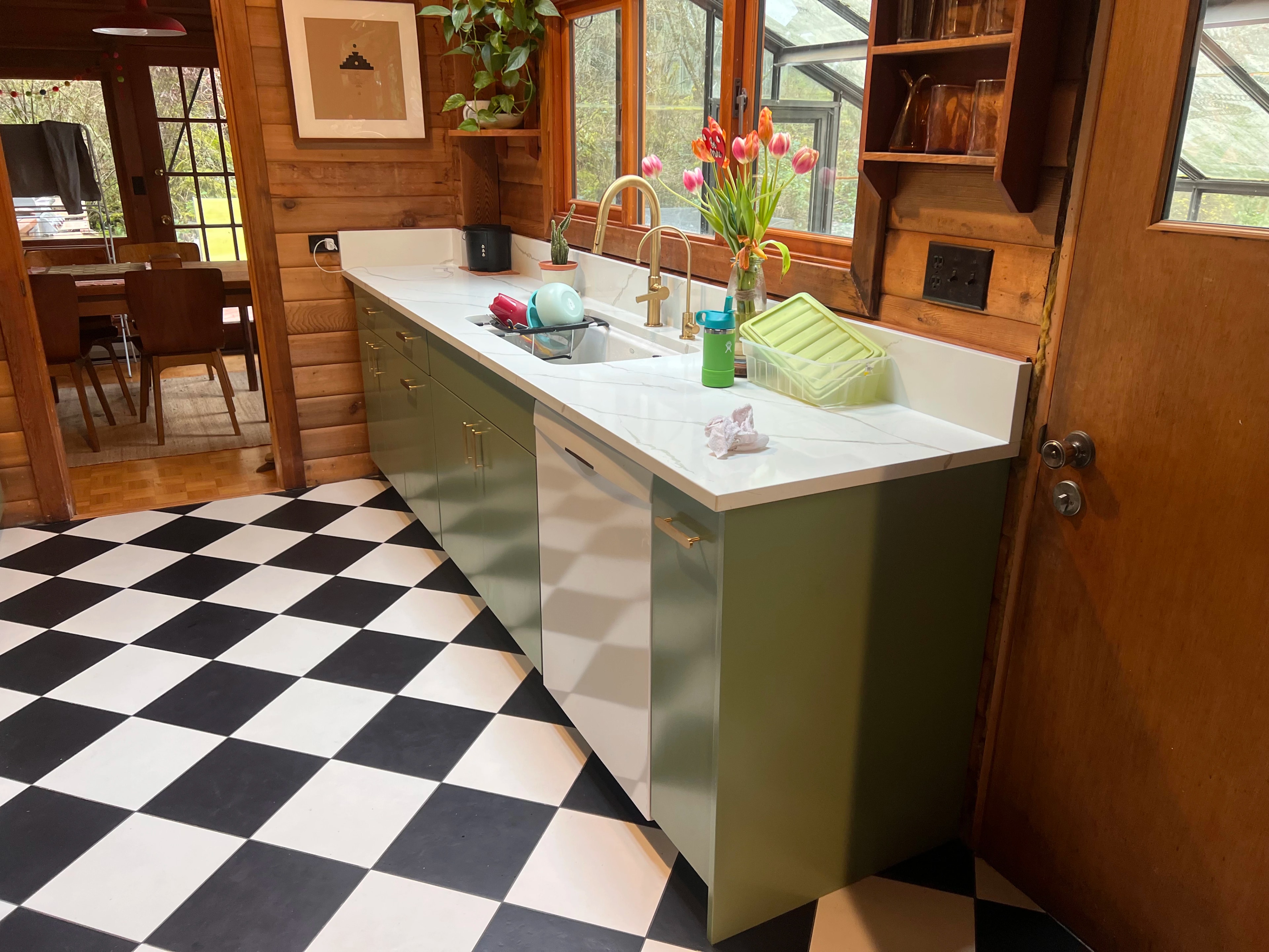 rustic checkerboard cabin kitchen by CVR Construction