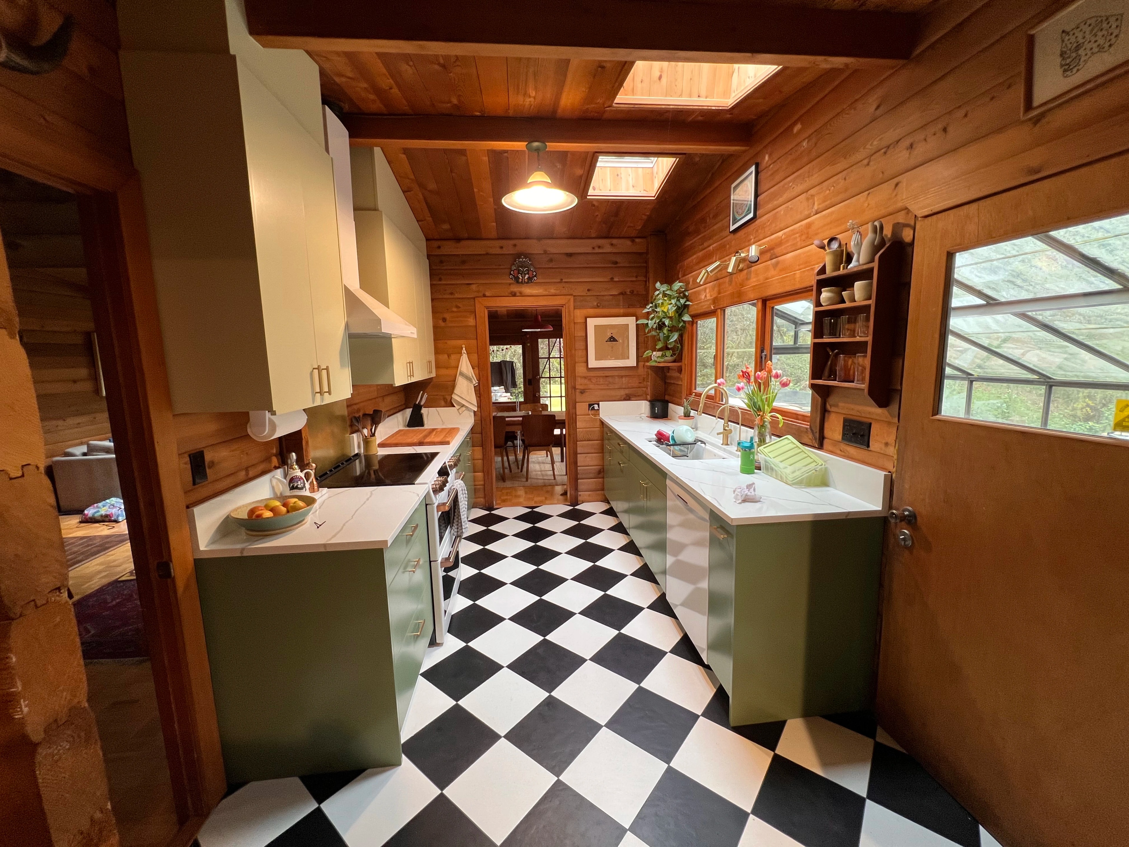 rustic checkerboard cabin kitchen by CVR Construction